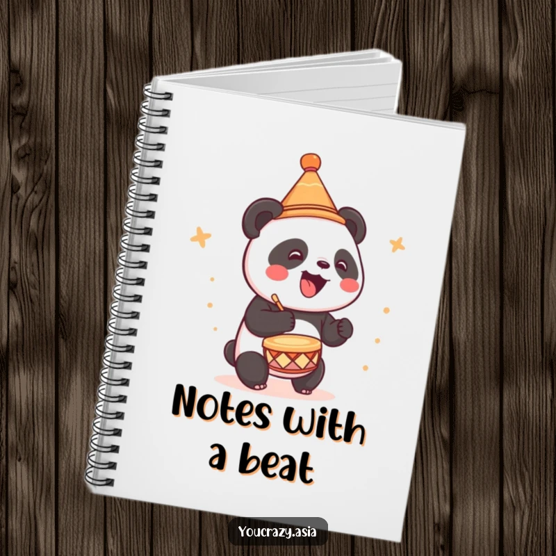 Funny notebook cover featuring a cute panda in a tiny party hat, joyfully drumming.