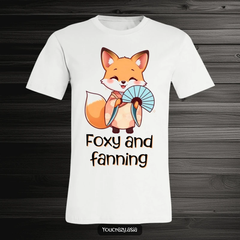 Funny t-shirt depicting a happy fox in a patterned kimono, gracefully holding a beautiful fan with poise.