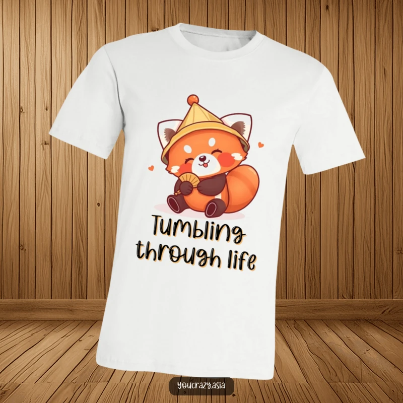 Funny Red Panda Hat T-Shirt: A playful red panda in a conical hat tumbles with a tiny fan; a heartwarming and humorous design.