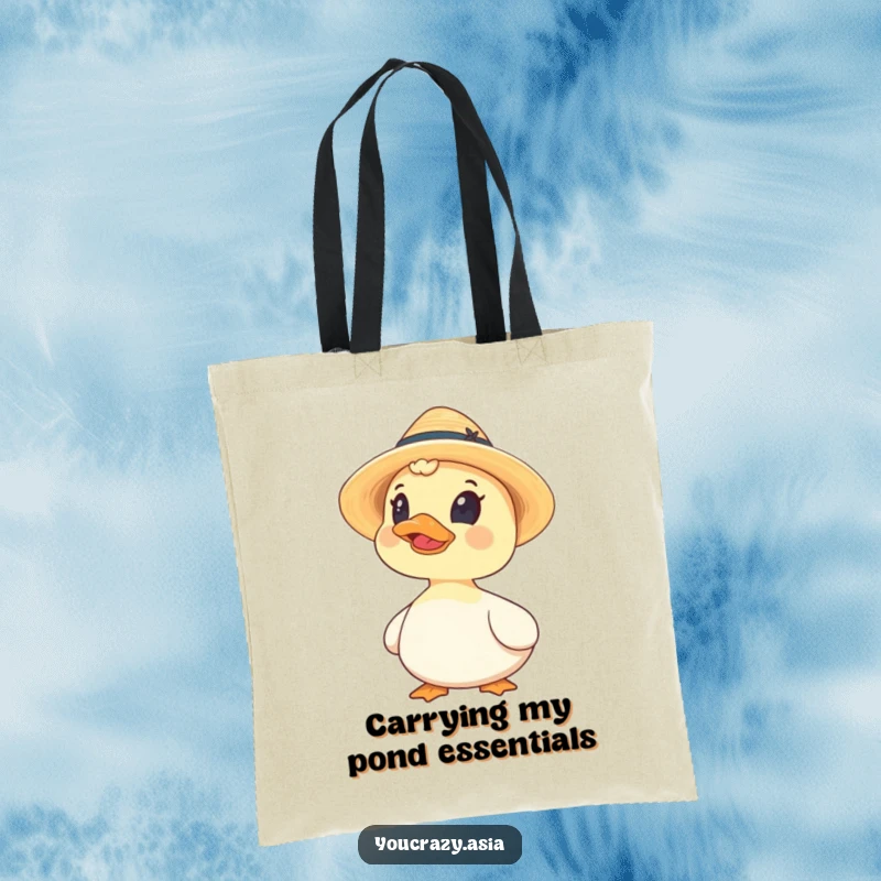 Funny tote bag print of a curious duck sporting a tiny straw hat and looking upwards with an amusing expression.